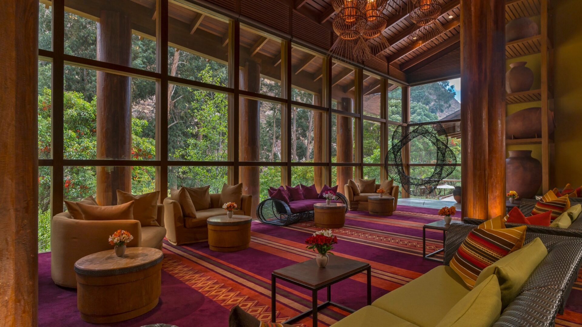 Living room with purple rug and green wicker couches